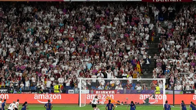 Fans behind the goal during the saved Germany penalty