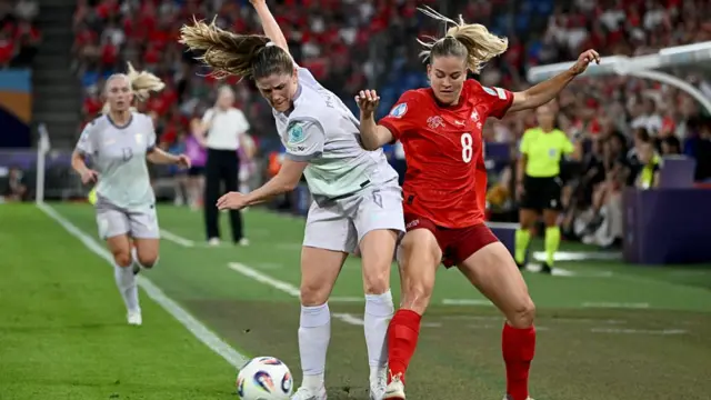Norway's defender #06 Maren Mjelde and Switzerland's defender #08 Nadine Riesen fight for the ball during the UEFA Women's Euro 2025 Group A football match between Switzerland and Norway at the St Jakob-Park Stadium in Basel on July 2, 2025.