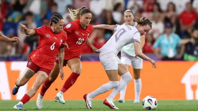 Norway's Caroline Graham Hansen in action with Switzerland's Geraldine Reuteler and Viola Calligaris