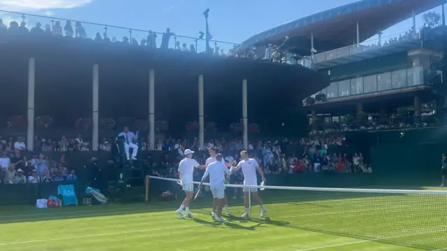 Dan Evans, Henry Searle, Henry Patten and Harri Heliovaara shake hands