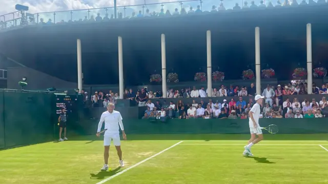 Dan Evans in action at Wimbledon