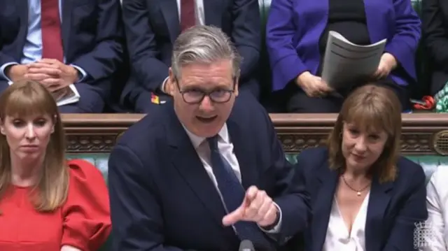 Starmer points as he speaks at the dispatch box at the House of Commons