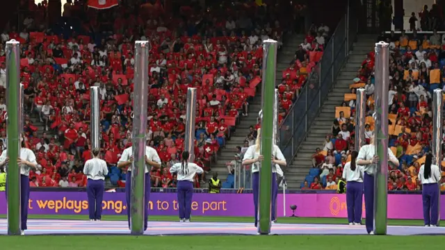 Performers take part in the opening ceremony of the UEFA Women's Euro 2025 'The Summit of Emotions' prior to the Group A football match between Switzerland and Norway at the St Jakob-Park Stadium in Basel on July 2, 2025.