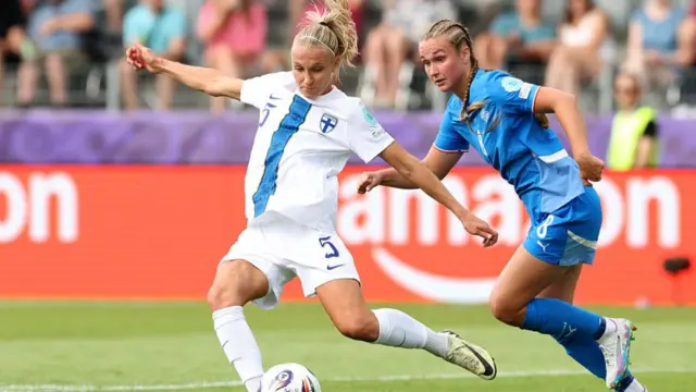 Emma Koivisto of Finland shoots under pressure from Alexandra Johannsdottir of Iceland during the UEFA Women's EURO 2025 Group A match between Iceland and Finland at Arena Thun