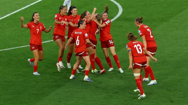 Switzerland's Nadine Riesen celebrates scoring their first goal