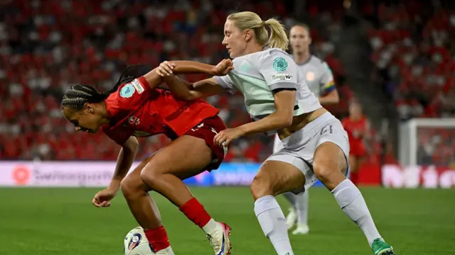 Switzerland's forward #19 Iman Beney (L) and Norway's midfielder #21 Lisa Naalsund fight for the ball during the UEFA Women's Euro 2025 Group A football match between Switzerland and Norway at the St Jakob-Park Stadium in Basel on July 2, 2025.