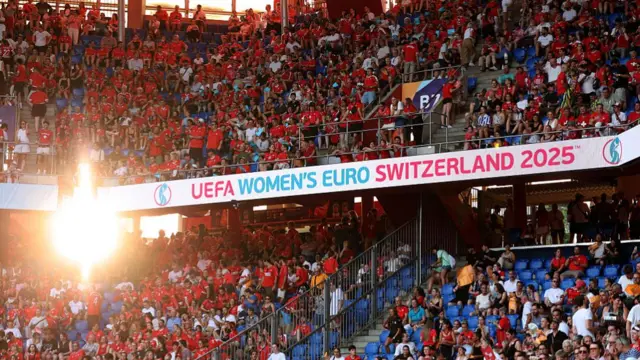 General view inside the stadium as the sunsets , while UEFA Women's Euro 2025 branding can be seen prior to the UEFA Women's EURO 2025 Group A match between Switzerland and Norway at St. Jakob-Park on July 02, 2025 in Basel, Switzerland.