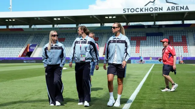 Hafrun Rakel Halldorsdottir, Karolina Vilhjalmsdottir and Dilja Zomers of Iceland inspect the pitch prior to the UEFA Women's EURO 2025 Group A match between Iceland and Finland at Arena Thun