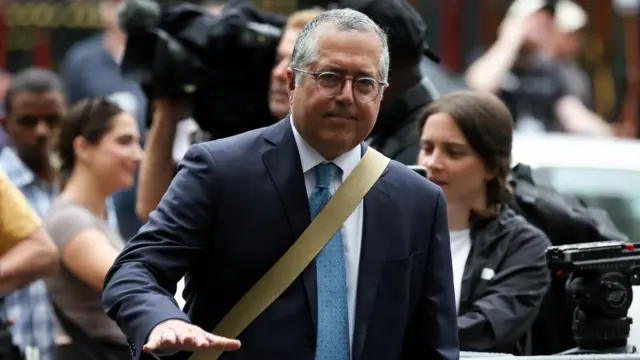 Marc Agnifilo, attorney for Sean "Diddy" Combs, walks outside the courthouse