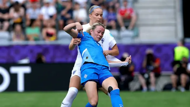 Sandra Maria Jessen of Iceland is challenged by Eva Nystroem of Finland during the UEFA Women's EURO 2025 Group A match between Iceland and Finland at Arena Thun