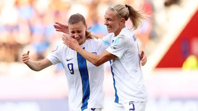 Katariina Kosola of Finland celebrates scoring her team's first goal with teammate Emma Koivisto during the UEFA Women's EURO 2025 Group A match between Iceland and Finland at Arena Thun