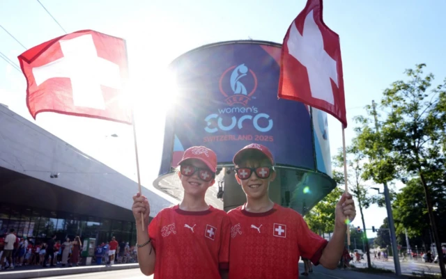 Fans outside pose