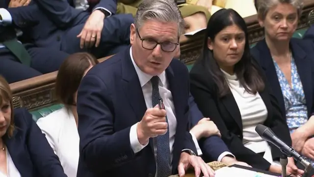 Starmer points as he speaks in the House of Commons