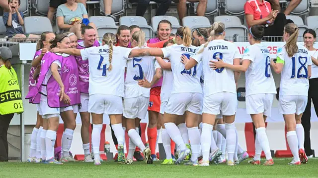 Katariina Kosola of Finland celebrates with her teammates after scoring the team's first goal during the UEFA Women's EURO 2025 Group A match between Iceland and Finland at Arena Thun on July 2, 2025