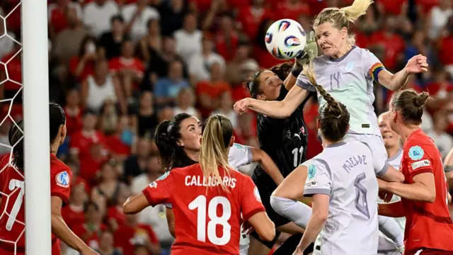 Norway's forward #14 Ada Hegerberg (Top) scores a goal during the UEFA Women's Euro 2025 Group A football match between Switzerland and Norway at the St Jakob-Park Stadium in Basel on July 2, 2025.