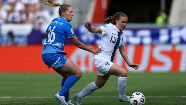 Oona Siren of Finland is challenged by Hildur Antonsdottir of Iceland during the UEFA Women's EURO 2025 Group A match between Iceland and Finland at Arena Thun