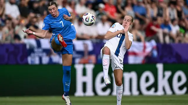 Iceland's midfielder #07 Karolina Lea Vilhjalmsdottir fights for the ball with Finland's midfielder #20 Eveliina Summanen during the UEFA Women's Euro 2025 Group A football match between Iceland and Finland at the Arena Thun