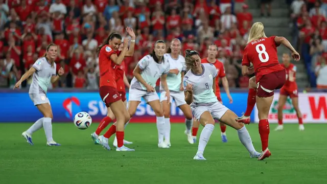 Nadine Riesen of Switzerland scores her team's first goal during the UEFA Women's EURO 2025 Group A match between Switzerland and Norway at St. Jakob-Park on July 02, 2025 in Basel, Switzerland.