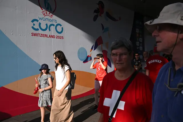 Fans outside walk