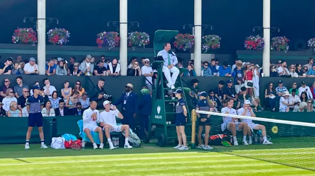 Dan Evans speaks to Henry Searle