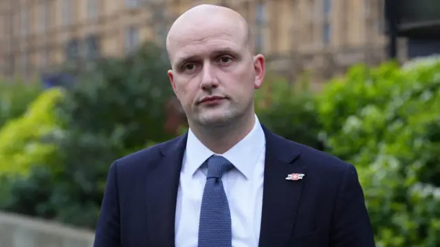 A file photo of SNP Westminster leader Stephen Flynn standing outside of Parliament