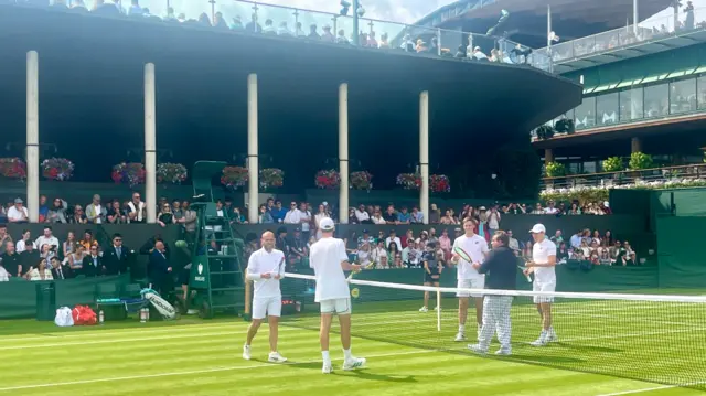A view of court four featuring Dan Evans