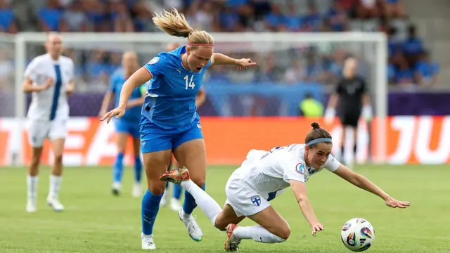Joanna Tynnila of Finland is challenged by Hlin Eiriksdottir of Iceland during the UEFA Women's EURO 2025 Group A match between Iceland and Finland at Arena Thun