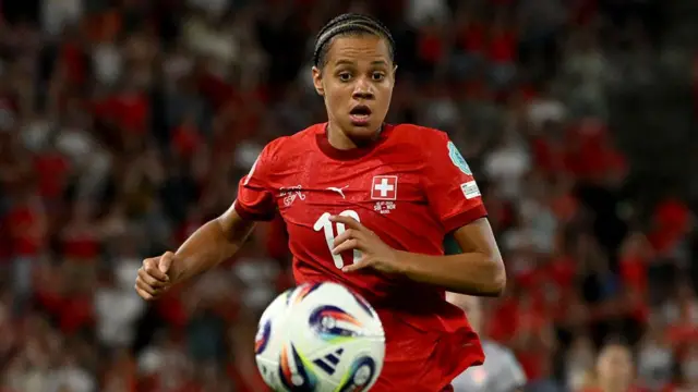 Switzerland's forward #19 Iman Beney eyes the ball during the UEFA Women's Euro 2025 Group A football match between Switzerland and Norway at the St Jakob-Park Stadium in Basel on July 2, 2025.