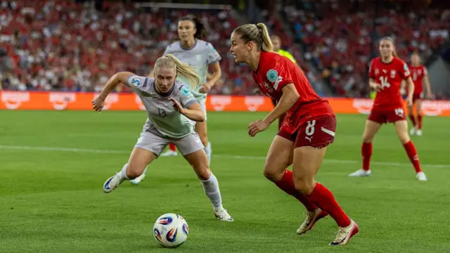 Nadine Riesen of Switzerland (R) and Thea Bjelde of Norway (L) battles for the ball with during the UEFA Women's EURO 2025 Group A match between Switzerland and Norway at St. Jakob-Park on July 2, 2025 in Basel, Switzerland.