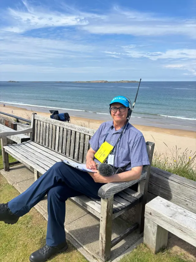 John Murray sitting on a bench