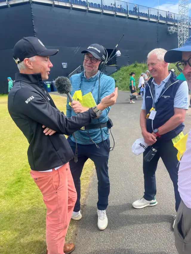 Jonathan Edwards talking to BBC Sport's Mark Chapman