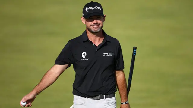 Brian Harman with his ball after a hole at The Open