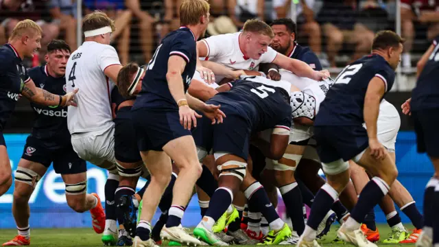 USA and England compete for the ball
