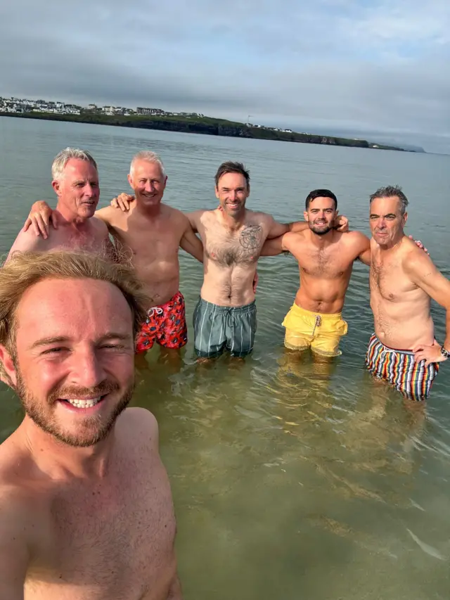 James Gregg, Andrew Murray, Oli Wilson and James Nesbitt in the sea at Portrush