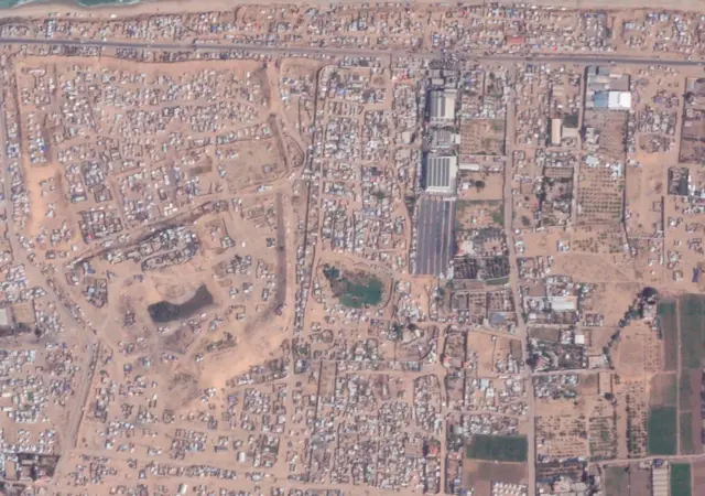 Satellite image shows thousands of tents and temporary shelters in area of Deir al-Balah asked to evacuate on Sunday with one of Gaza’s three desalination plants located among them