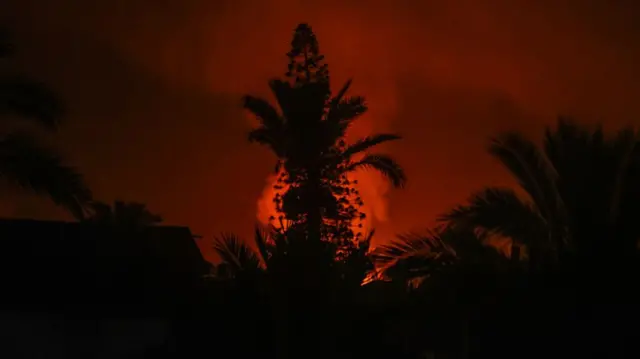Smoke rises in Deir al-Balah during the Israeli assault on Monday morning