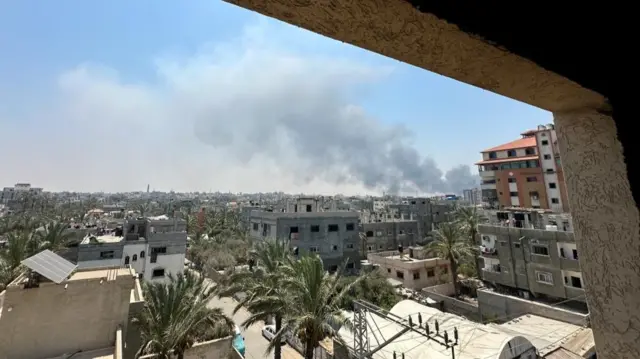 Smoke rises during Israeli strikes amid the Israeli military operation in Deir Al-Balah, in the central Gaza Strip, July 21, 2025.