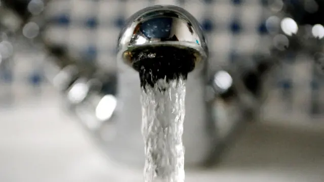 Picture of tap with water coming out