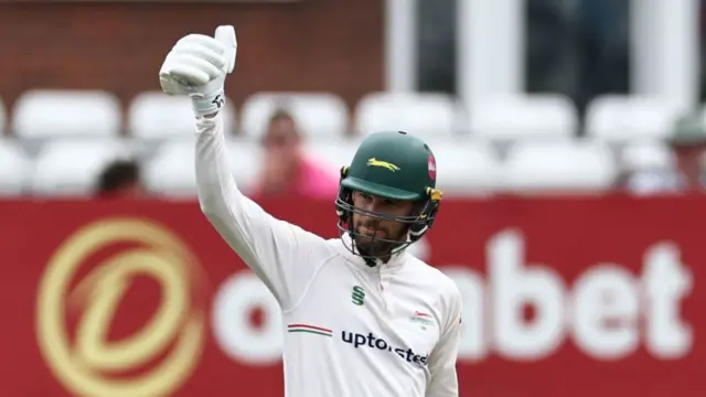 Leicestershire's Peter Handscomb acknowledges the crowd