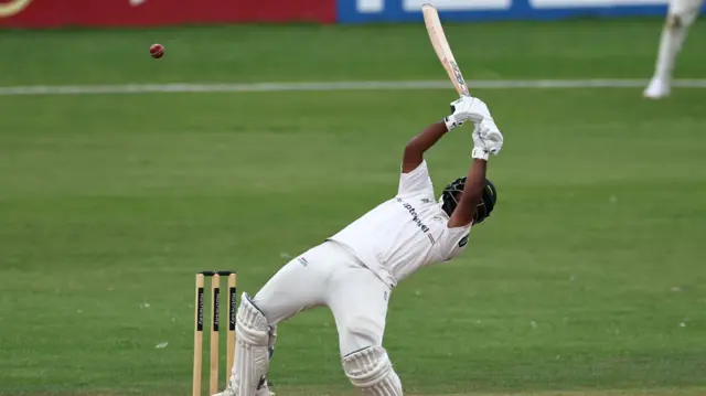 Rehan Ahmed playing a ramp shot for Leicestershire at Derbyshire