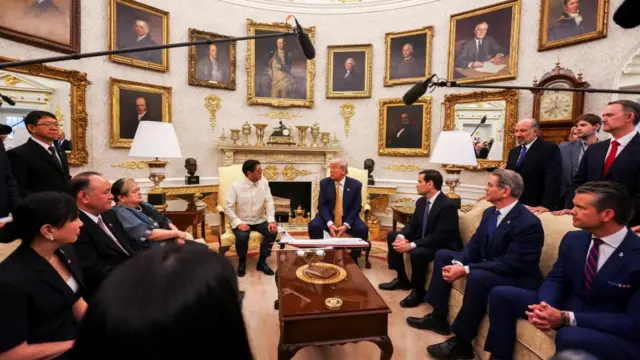 Philippine President Bongbong Marcos and US President Donald Trump meet in the Oval Office with officials and press