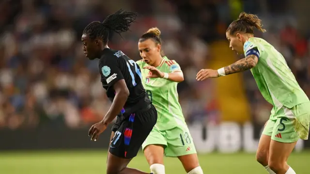 Michelle Agyemang of England runs for the ball whilst under pressure form Arianna Caruso and Elena Linari of Italy