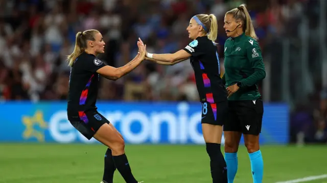 Georgia Stanway of England is substituted off for teammate Chloe Kelly