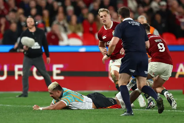 Rob Leota of the First Nations & Pasifika scores a try