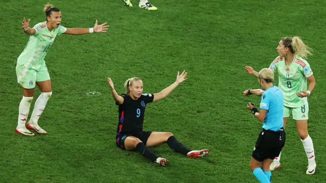 Referee Ivana Martincic gestures to the penalty spot after Beth Mead of England is fouled