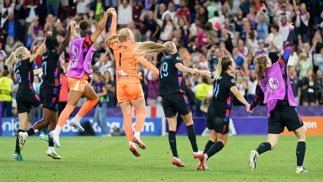 England team celebrates after winning