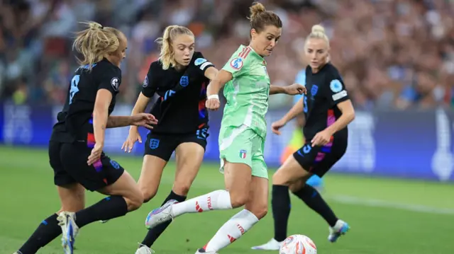 Cristiana Girelli of Italy under pressure from Georgia Stanway and Esme Morgan of England