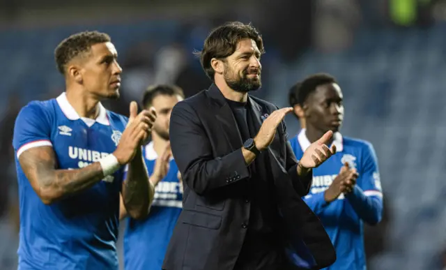 Russell Martin and his players applaud the fans at full-time