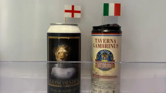 2 beer bottles in the fridge with England and Italy flags