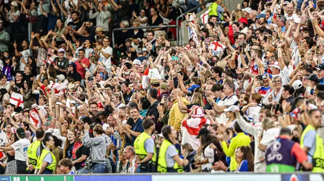fans of England celebrate the late goal